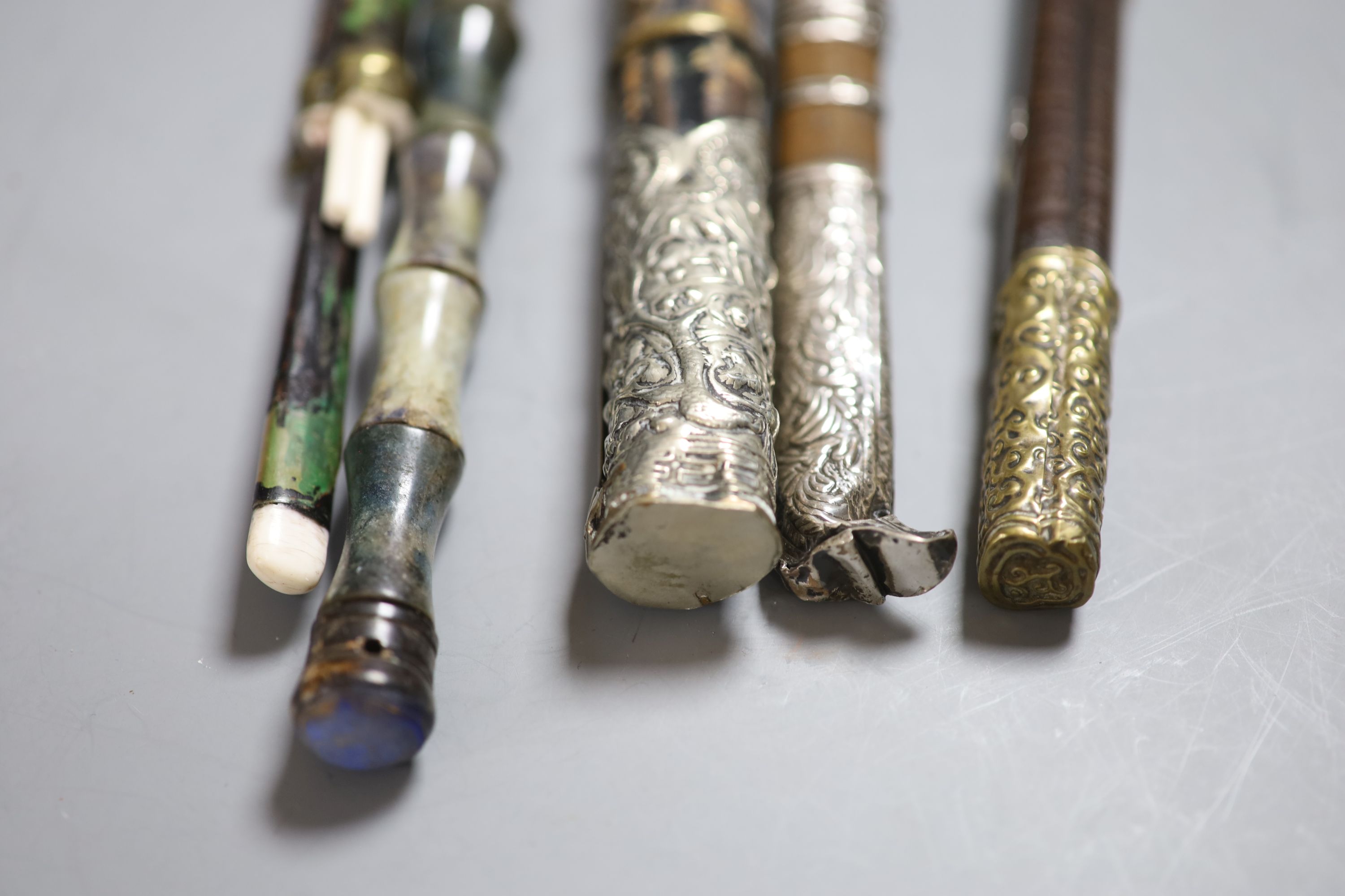 Three South East Asian chop stick sets and knife holders, c.19th and 20th century, a dagger etc